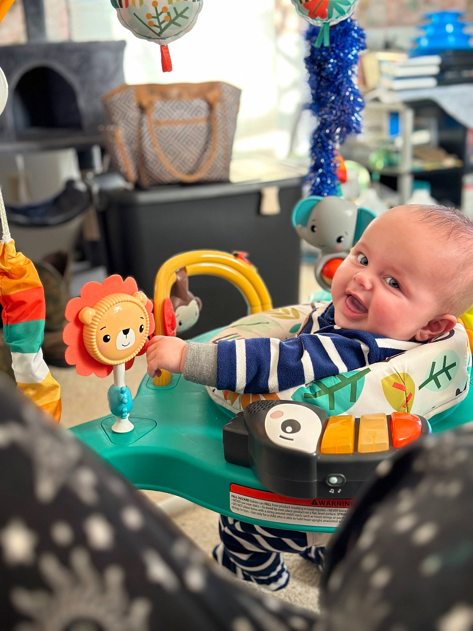 Brantley joined the competition — help win amazing prizes! baby, baby_products, baby_toddler_clothing, baby_toys, chair, child, event, fun, green, happy, leisure, mammal, person, play, recreation, room, sitting, smile, textile, toddler