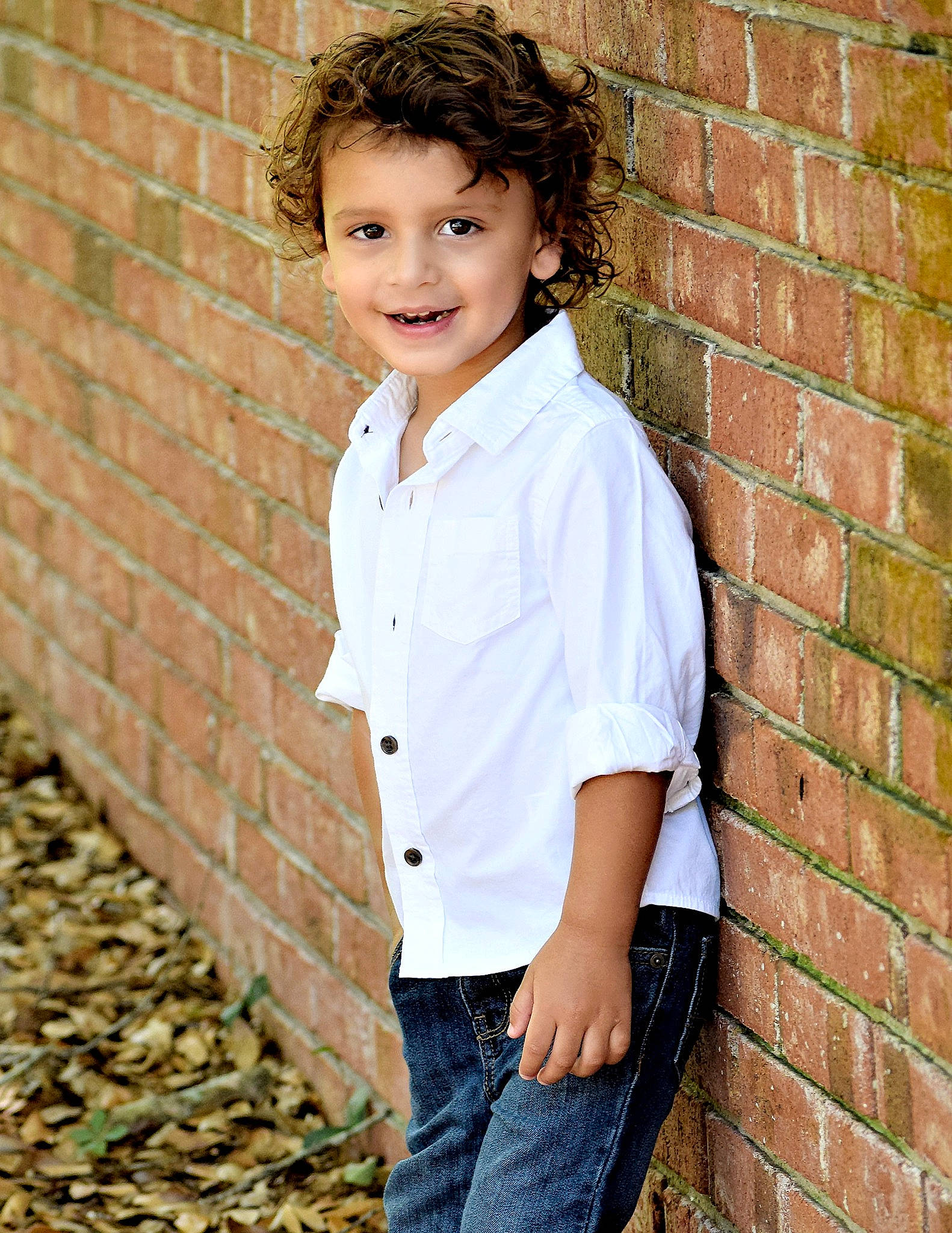 Alijah is registered to the contest to win money with this photo: brick, child, child_model, cool, denim, dress_shirt, jeans, joy, male, outerwear, person, photo_shoot, photograph, photography, portrait, portrait_photography, shirt, sleeve, smile, t_shirt