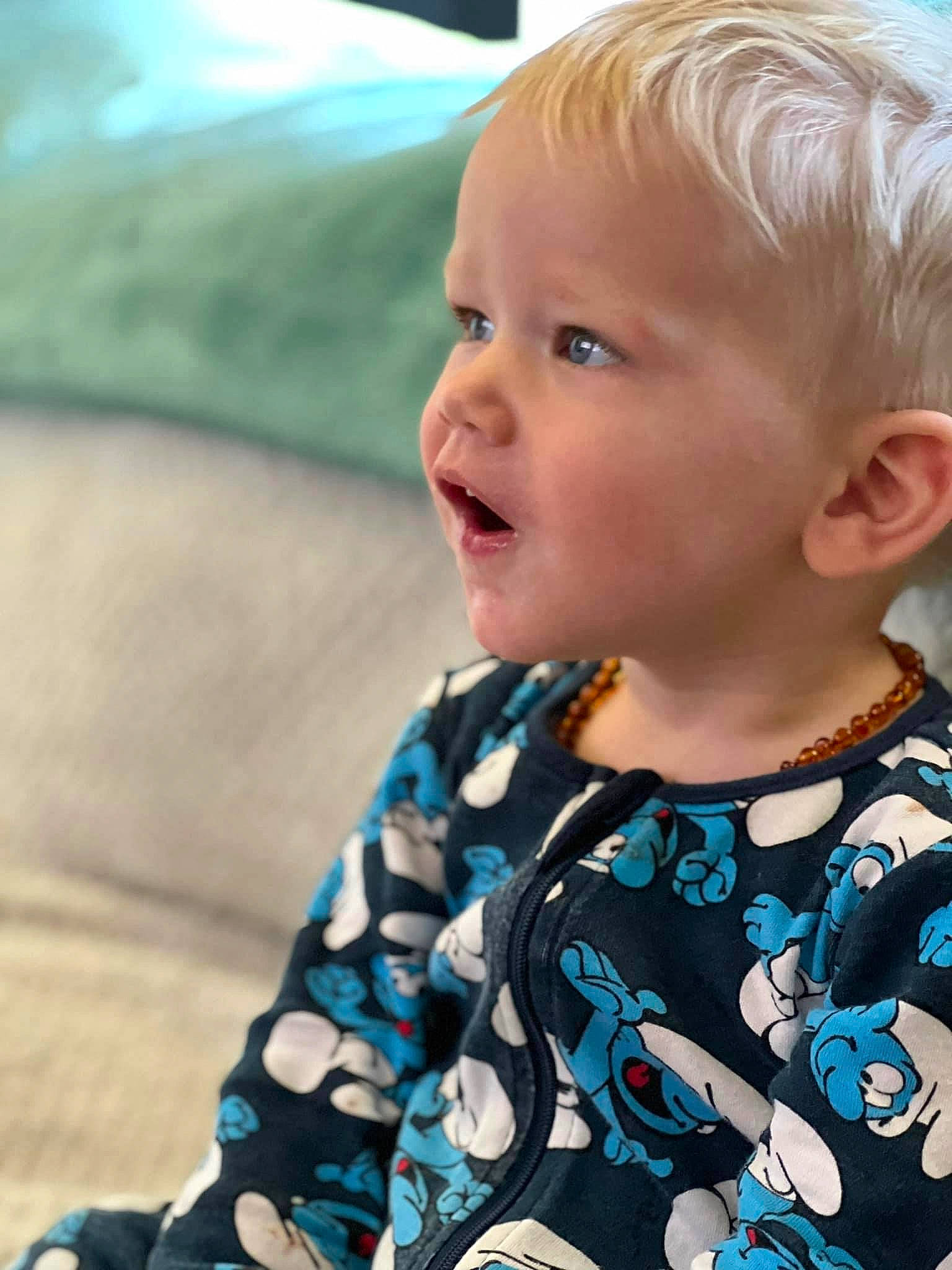Bexley is registered to the contest to win money with this photo: baby, baby_toddler_clothing, blond, cheek, cool, ear, electric_blue, eye, eyelash, hair, happy, head, human_body, iris, nose, pattern, person, skin, sleeve, t_shirt