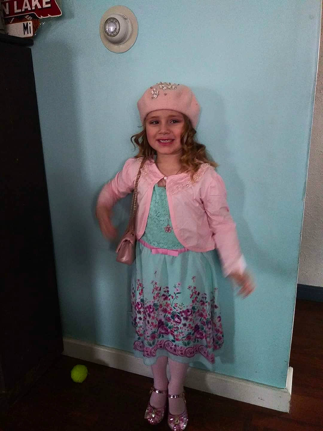 Khloe joined the competition — help win amazing prizes! child, clothing, costume, dress, headgear, headpiece, headwear, joy, pattern, peach, person, pink