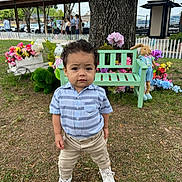 Jack Nolen joined the competition — help win amazing prizes! toddler, child, grass, tree, bench, flowers, stuffed_animals, outdoor, park, toy, greenery, people, background, clothing, shoes, shirt, pants, nature, daytime, curly_hair