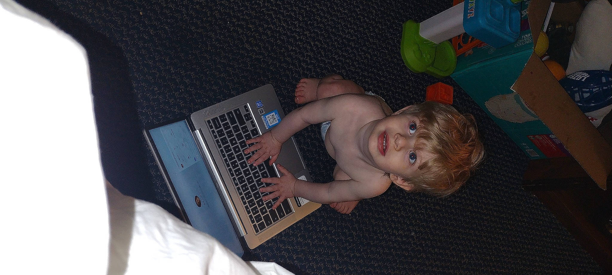 Jasiah joined the competition — help win amazing prizes! baby, child, comfort, computer, computer_hardware, elbow, flooring, fun, gadget, input_device, laptop, netbook, office_equipment, output_device, peripheral, person, personal_computer, space_bar, toddler, touchpad