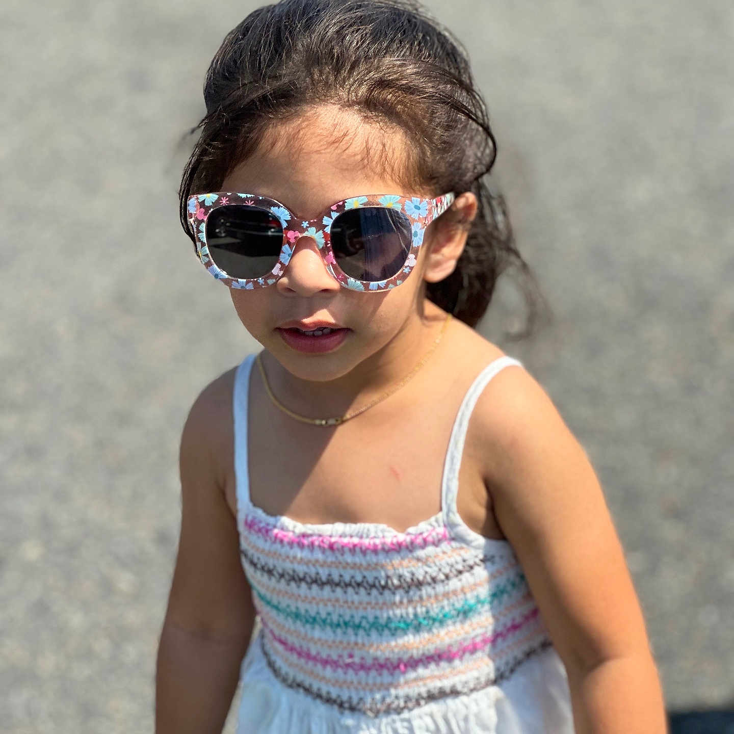 Sahib is registered to the contest to win money with this photo: accessories, bracelet, casual, child, colorful, cute, daylight, dress, fashion, girl, hair, knit, outdoor, person, portrait, standing, summer, sunglasses, sunlight, young