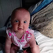 Aero joined the competition — help win amazing prizes! arms, baby, bed, blanket, child, clothing, cute, expression, face, indoors, infant, looking, mouth_open, pattern, person, pillow, pink, sitting, skin, young
