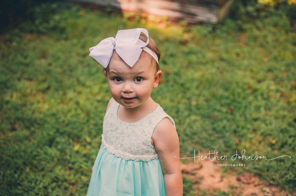 Ruby Mae joined the competition — help win amazing prizes! baby, child, child_model, dress, hair_accessory, happy, head, headband, headgear, headpiece, person, photograph, photography, portrait, portrait_photography, smile, toddler