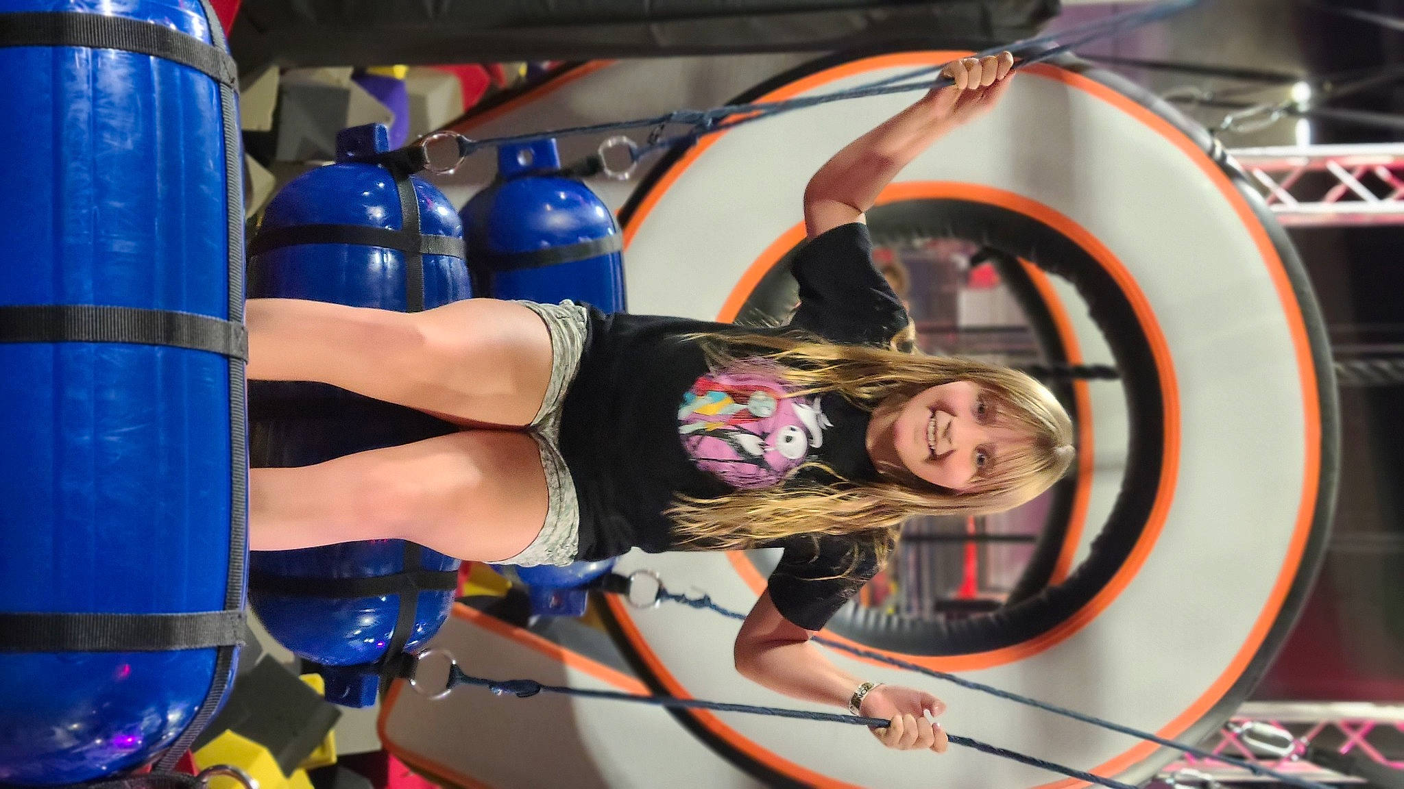 Briana is registered to the contest to win money with this photo: alloy_wheel, automotive_design, automotive_exterior, automotive_lighting, automotive_tire, bumper, car, fashion, hood, joy, leg, motor_vehicle, muscle, person, rim, shoe, shorts, sneakers, thigh, tire