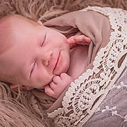 Bayley joined the competition — help win amazing prizes! baby, blanket, closeup, cozy, cute, face, hand, infant, lace, newborn, peaceful, portrait, resting, skin, sleeping, smile, soft_texture, tender, warm, wrapped