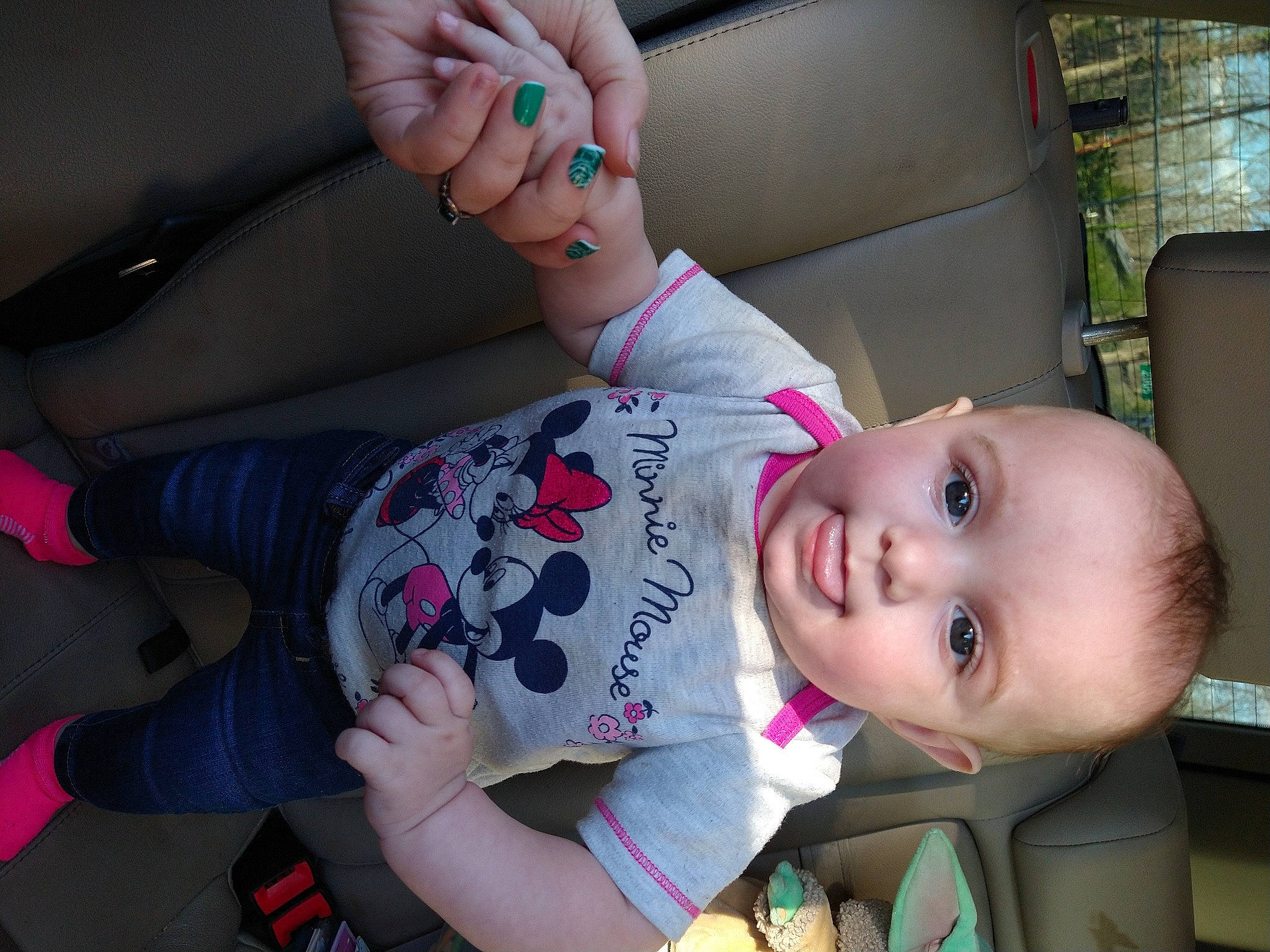 April is registered to the contest to win money with this photo: arm, baby, baby_products, cheek, eyewear, fun, hand, happy, human_leg, lip, mouth, nose, person, photograph, pink, plant, skin, snapshot, sunglasses, toddler