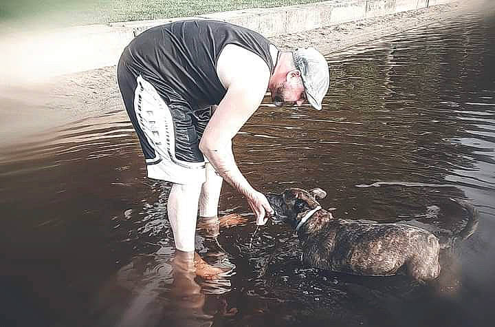 April joined the competition — help win amazing prizes! carnivore, companion_dog, dog, flash_photography, fun, grass, happy, human_leg, lake, leisure, people_in_nature, recreation, reflection, shorts, soil, sunglasses, t_shirt, tree, water, water_resources