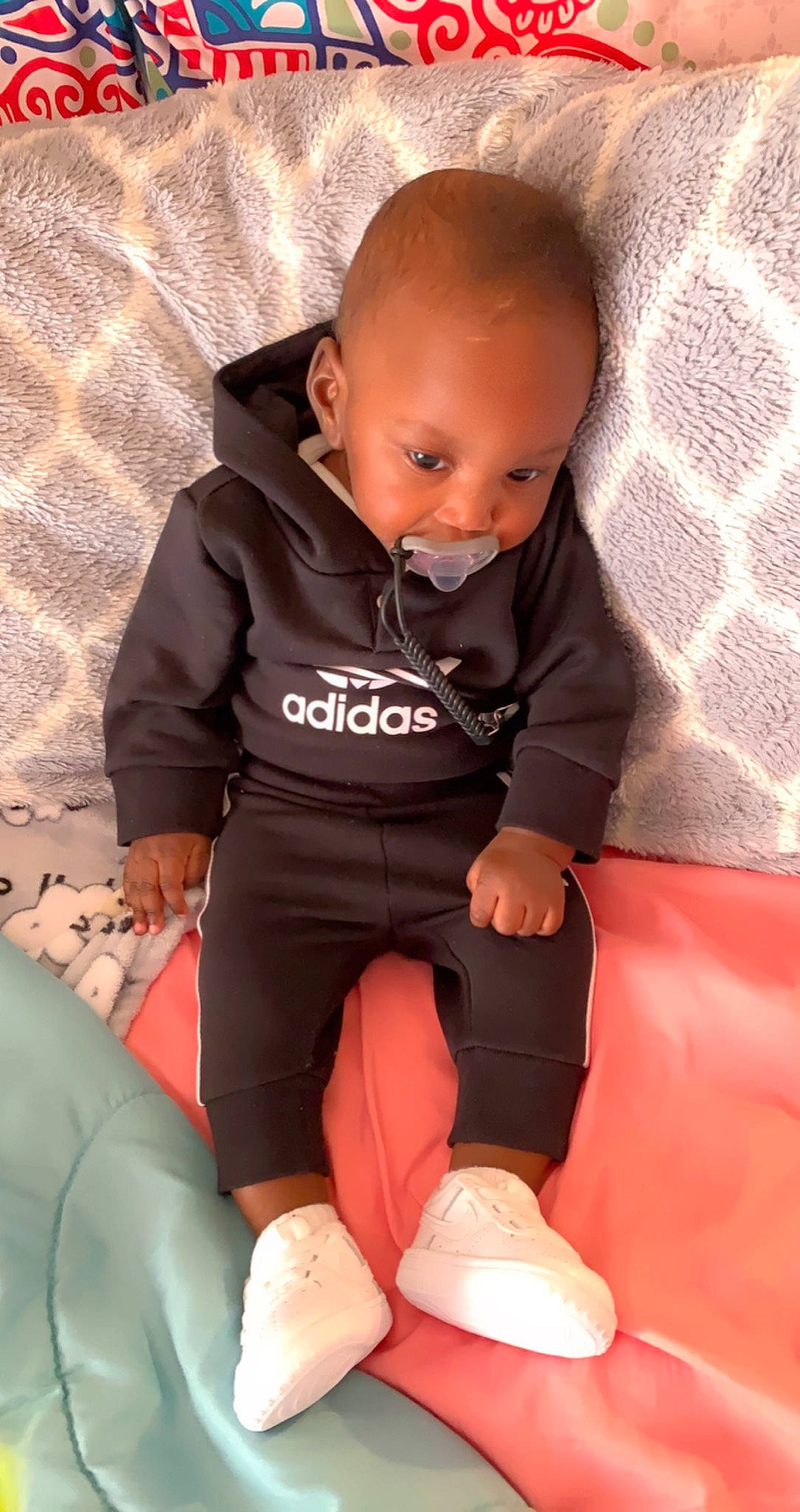 Braylin joined the competition — help win amazing prizes! arm, baby, baby_products, baby_toddler_clothing, car_seat, child, comfort, flooring, foot, human_leg, joint, knee, lap, leg, person, sitting, sleeve, sock, thigh, thumb
