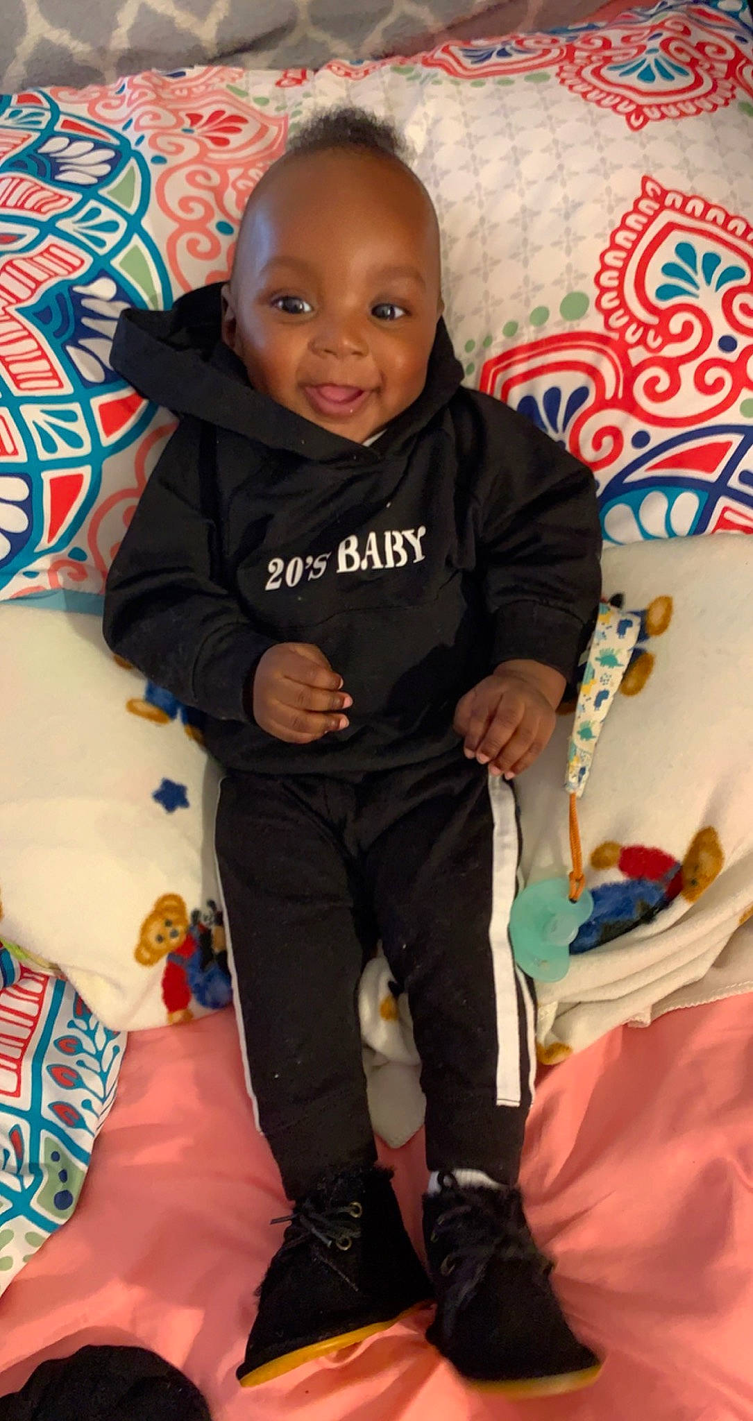 Braylin is registered to the contest to win money with this photo: baby, baby_toddler_clothing, cheek, child, comfort, face, fun, happy, head, joy, organ, person, red, shoe, skin, sleeve, smile, sneakers, t_shirt, textile