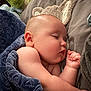 baby, sleeping, blanket, plush_toy, soft, peaceful, infant, child, cozy, bed, cute, rest, comfort, indoors, skin, face, arm, fingers, head, warm