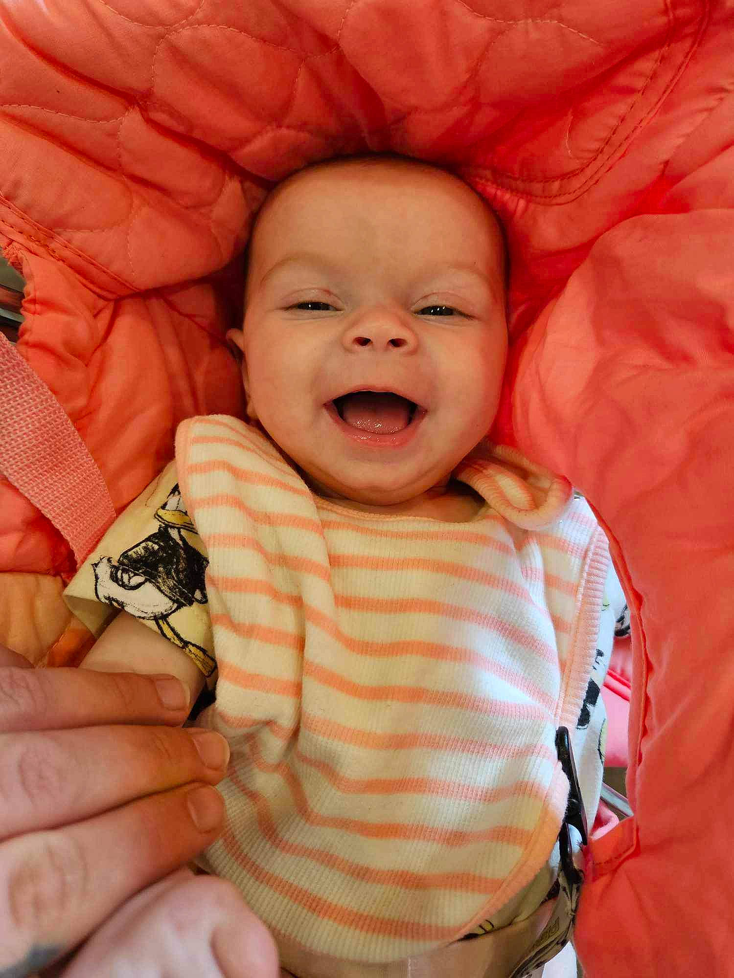 Mylah joined the competition — help win amazing prizes! baby, baby_toddler_clothing, cheek, comfort, eye, face, finger, gesture, happy, head, lip, mouth, nose, orange, person, pink, product, skin, sleeve, smile