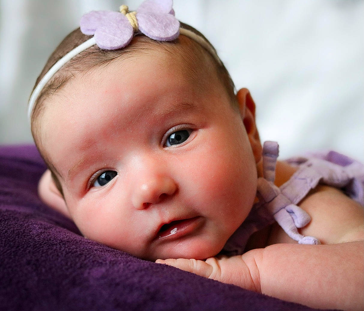 Emma joined the competition — help win amazing prizes! baby, baby_toddler_clothing, cheek, chin, ear, eye, eyebrow, eyelash, flash_photography, gesture, grass, hair, happy, head, headband, human_body, iris, lip, person, skin