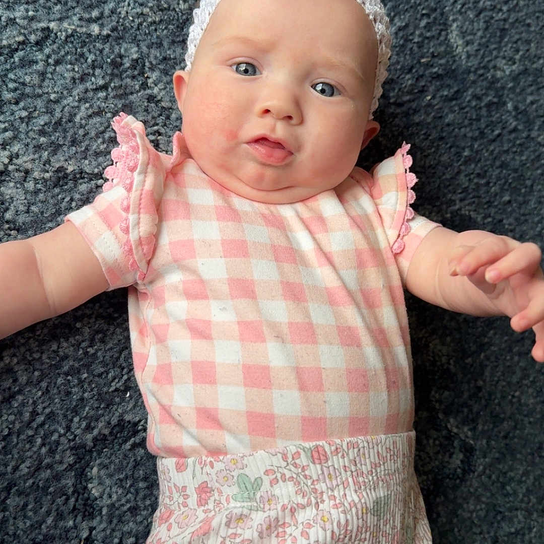 Emzleigh joined the competition — help win amazing prizes! accessories, baby, bodypart, bonnet, cap, clothing, costume, dress, face, finger, hand, hat, head, homedecor, newborn, pants, person, photography, portrait, shorts