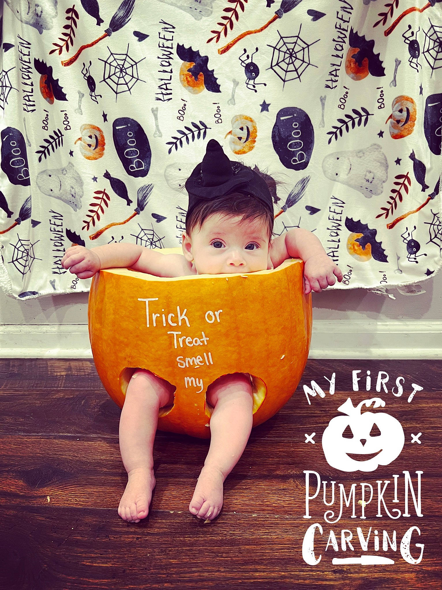 Quinn is registered to the contest to win money with this photo: advertising, baby, baby_toddler_clothing, child, cool, flooring, font, fun, happy, leisure, orange, pattern, person, photo_caption, play, room, sitting, t_shirt, thigh, toddler