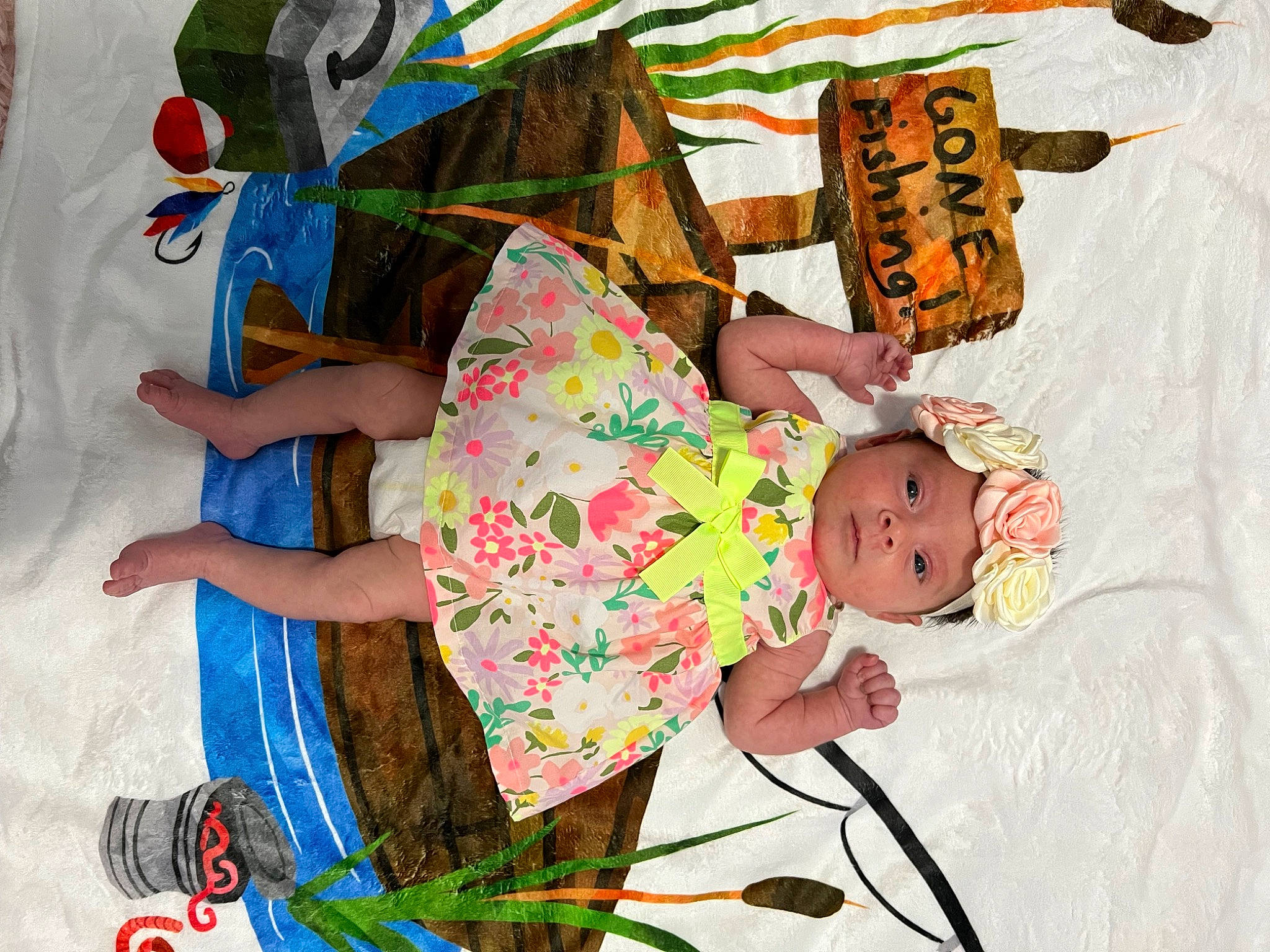 Quinn is registered to the contest to win money with this photo: adaptation, baby, baby_toddler_clothing, child, event, fun, happy, hat, headwear, leisure, linens, pattern, person, play, product, room, sandal, t_shirt, textile, toddler