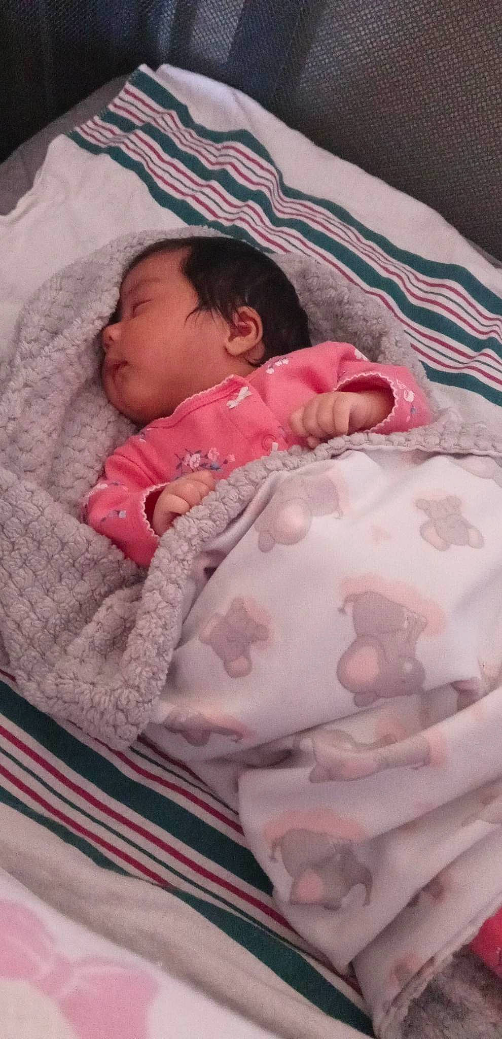 Briella joined the competition — help win amazing prizes! baby, baby_products, baby_sleeping, baby_toddler_clothing, bedtime, carmine, cheek, child, comfort, eye, face, head, linens, pattern, person, pink, room, skin, sleeve, textile