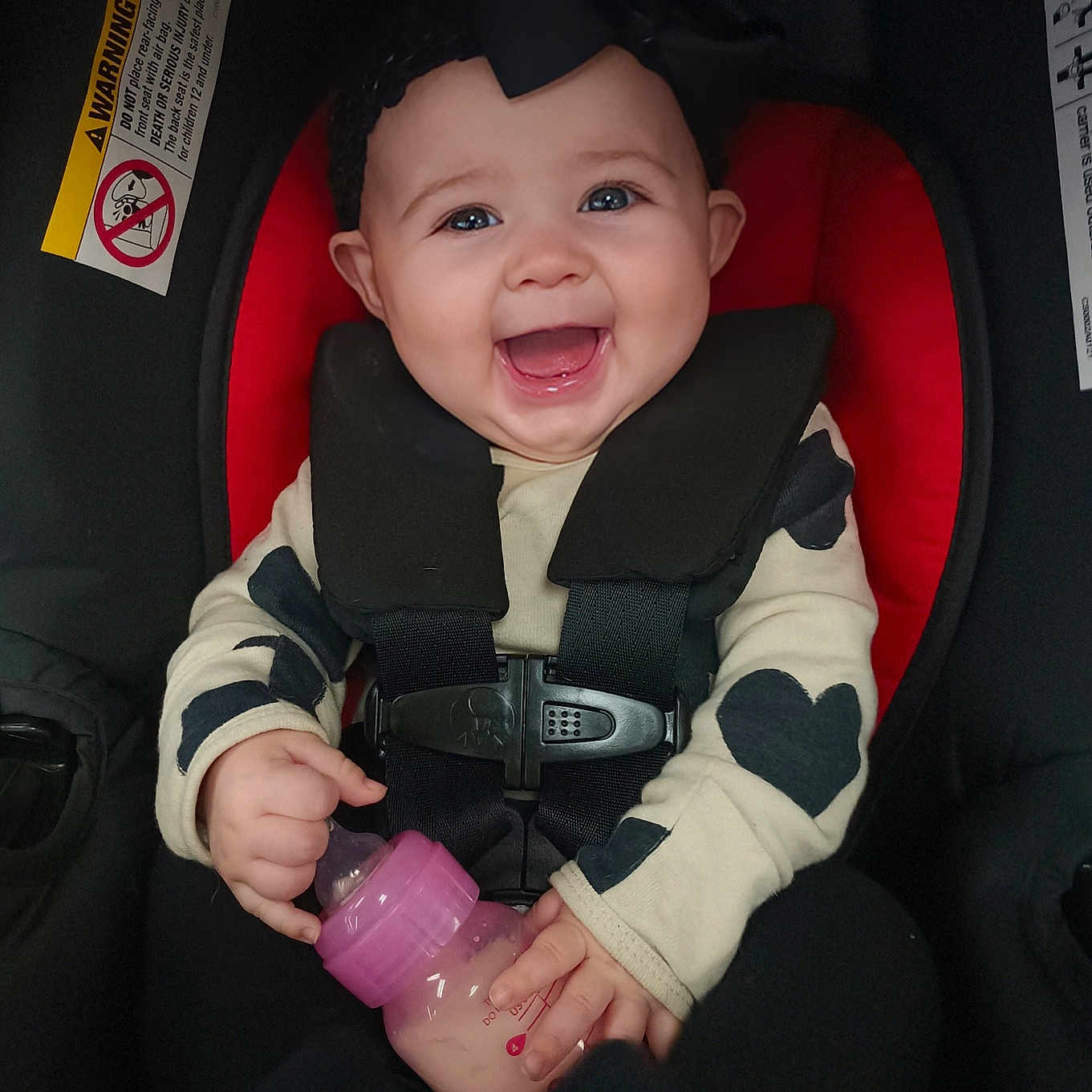 Kera joined the competition — help win amazing prizes! accessories, baby, babylaughing, belt, bodypart, bottle, clothing, cushion, face, finger, hand, happy, head, homedecor, lifejacket, person, photography, portrait, shaker, vest