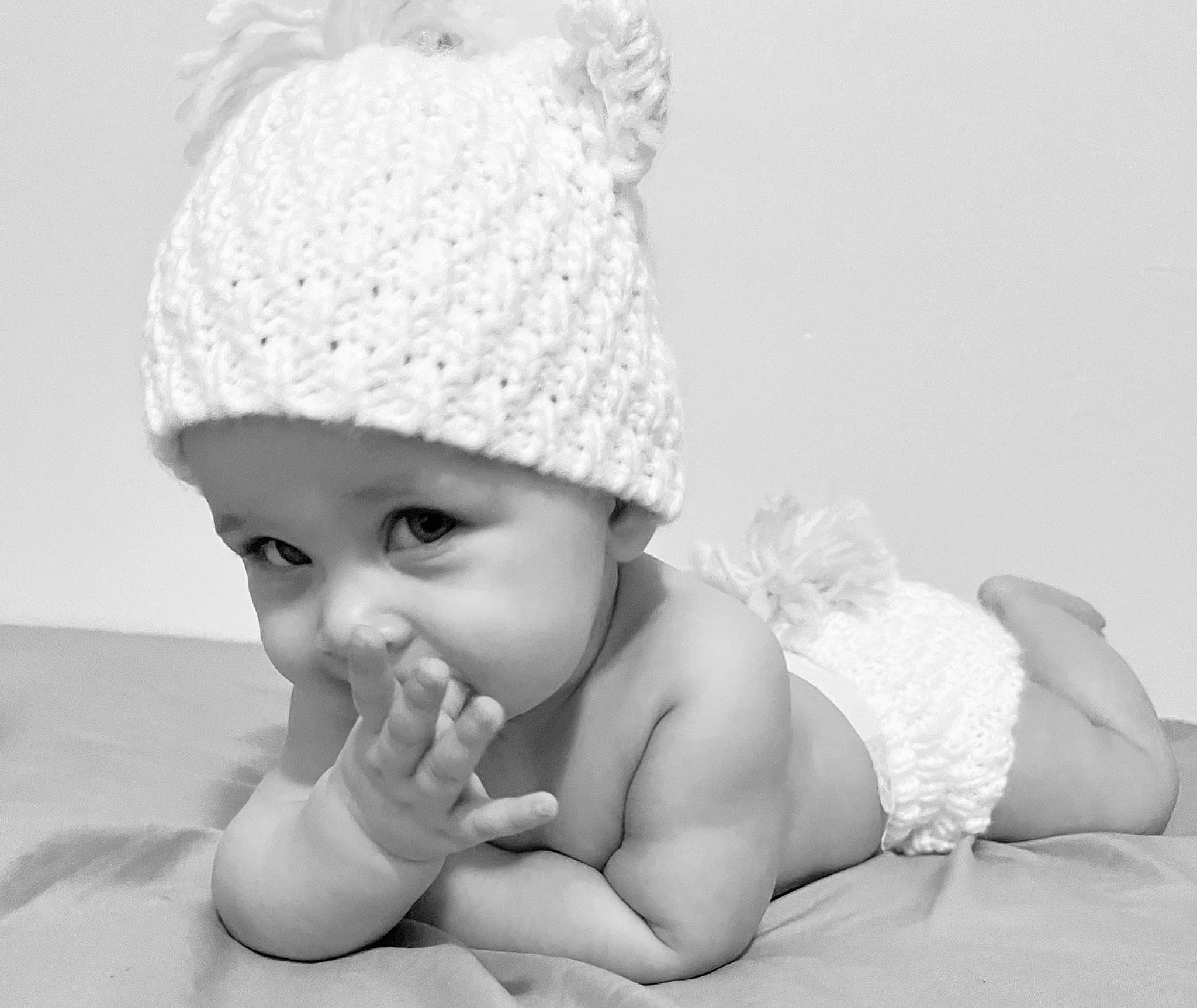 Scarlett joined the competition — help win amazing prizes! arm, baby, baby_toddler_clothing, cap, child, comfort, eye, face, finger, flash_photography, gesture, happy, headgear, headwear, lip, monochrome_photography, person, photograph, skin, smile