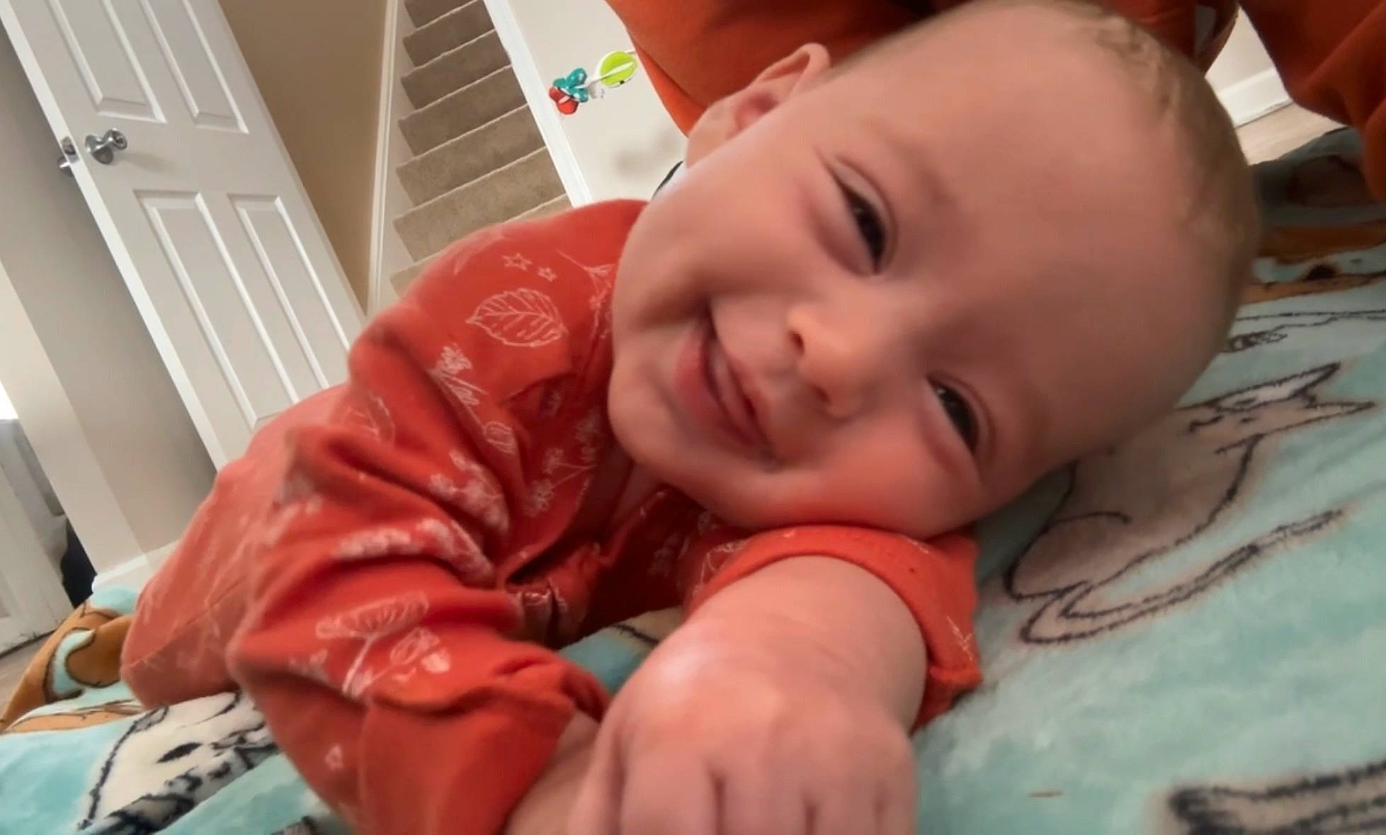 Lainey is registered to the contest to win money with this photo: baby, baby_toddler_clothing, cheek, child, chin, comfort, eyebrow, finger, flooring, fun, happy, head, iris, joy, mouth, nose, person, room, skin, smile