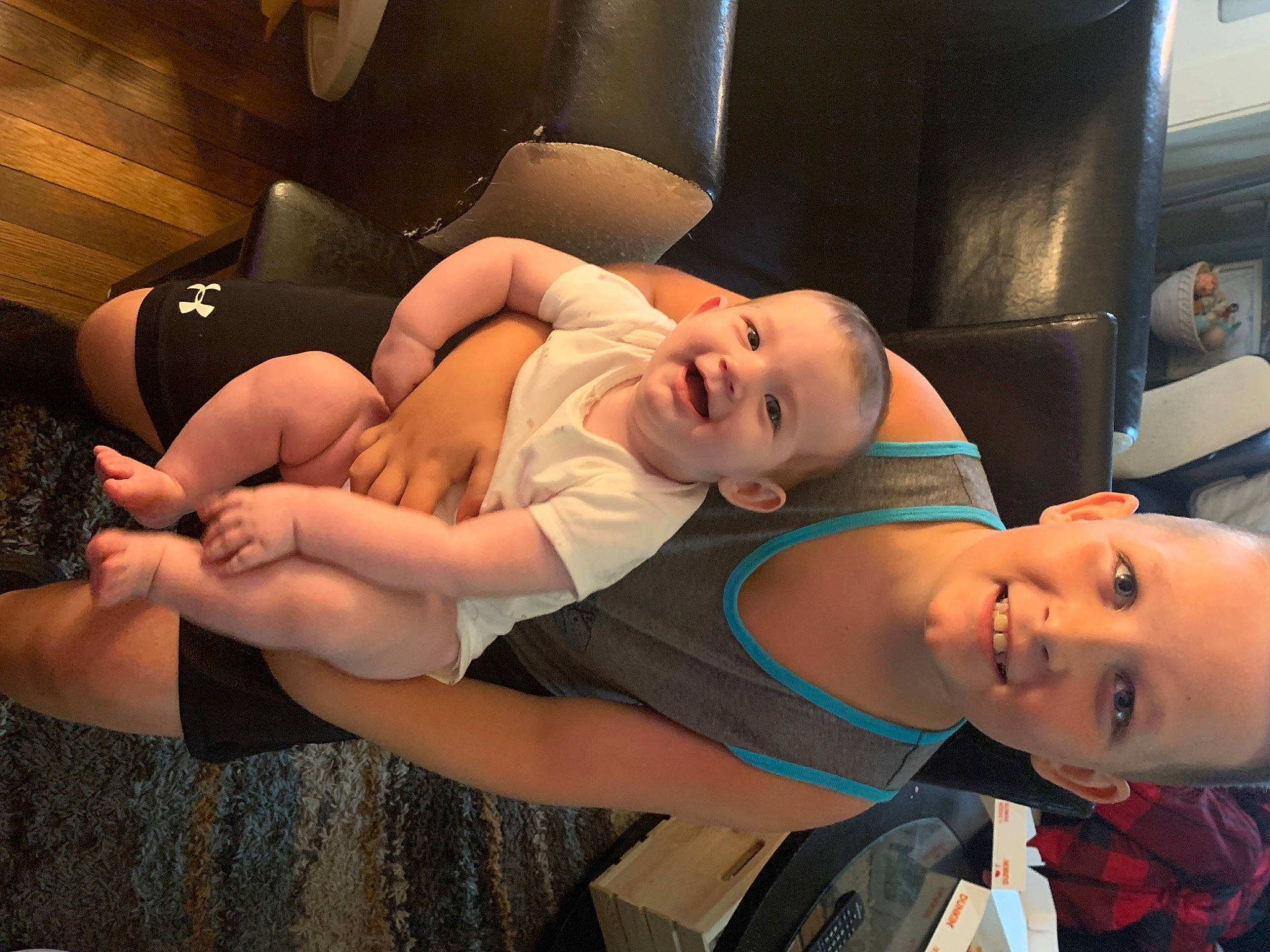 Brylee is registered to the contest to win money with this photo: arm, automotive_design, black_hair, chest, comfort, elbow, eyewear, facial_expression, flash_photography, fun, happy, joint, joy, knee, leg, mouth, muscle, person, shoulder, smile