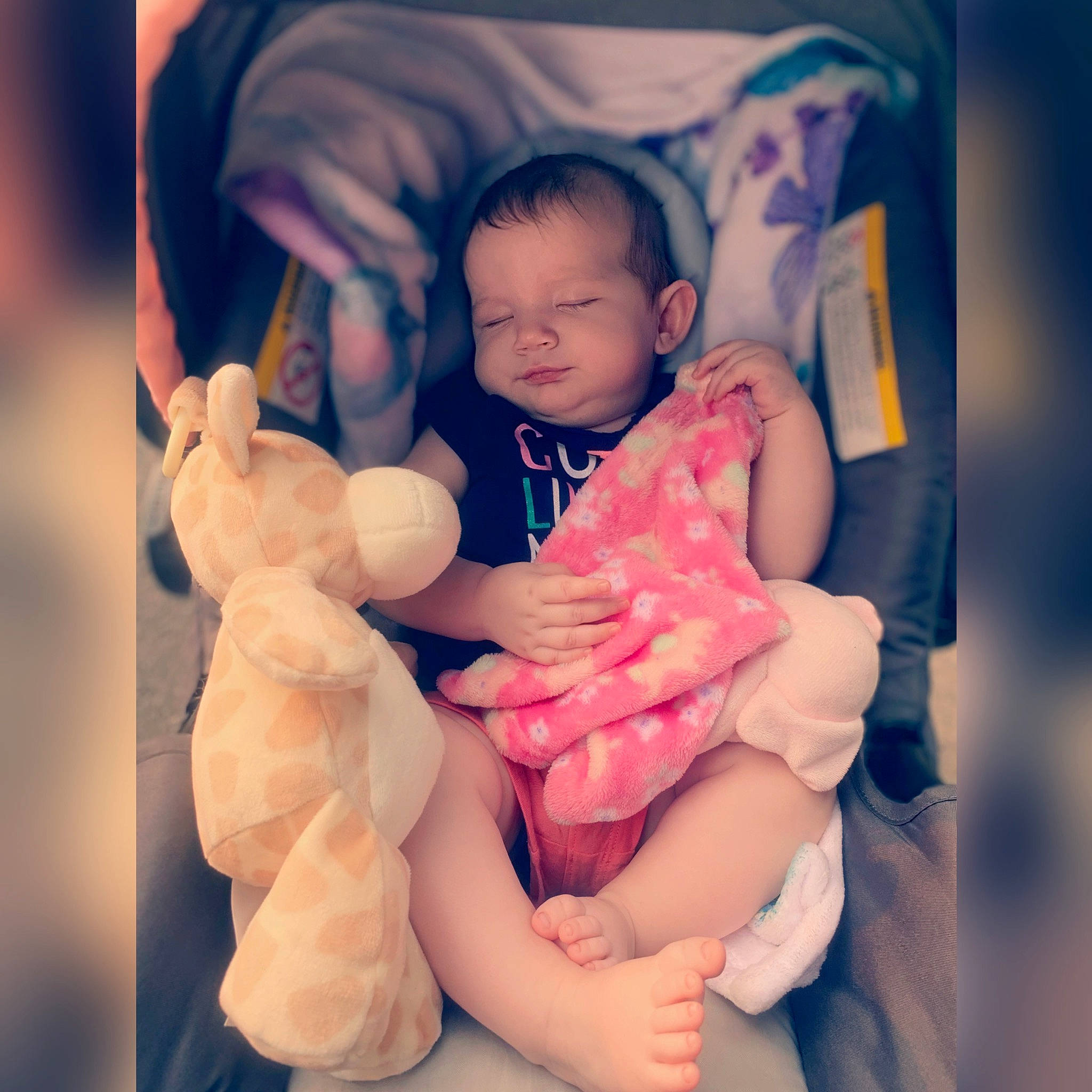 Brylee is registered to the contest to win money with this photo: abdomen, baby, baby_toddler_clothing, cheek, comfort, eye, finger, flash_photography, gesture, hand, happy, head, human_body, leg, nail, person, pink, skin, thumb, toddler