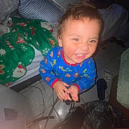 Nathan joined the competition — help win amazing prizes! toddler, child, smiling, pajamas, indoor, blanket, floor, tile, bed, clutter, happy, person, face, room, footwear, furniture, cord, hand, expression, home