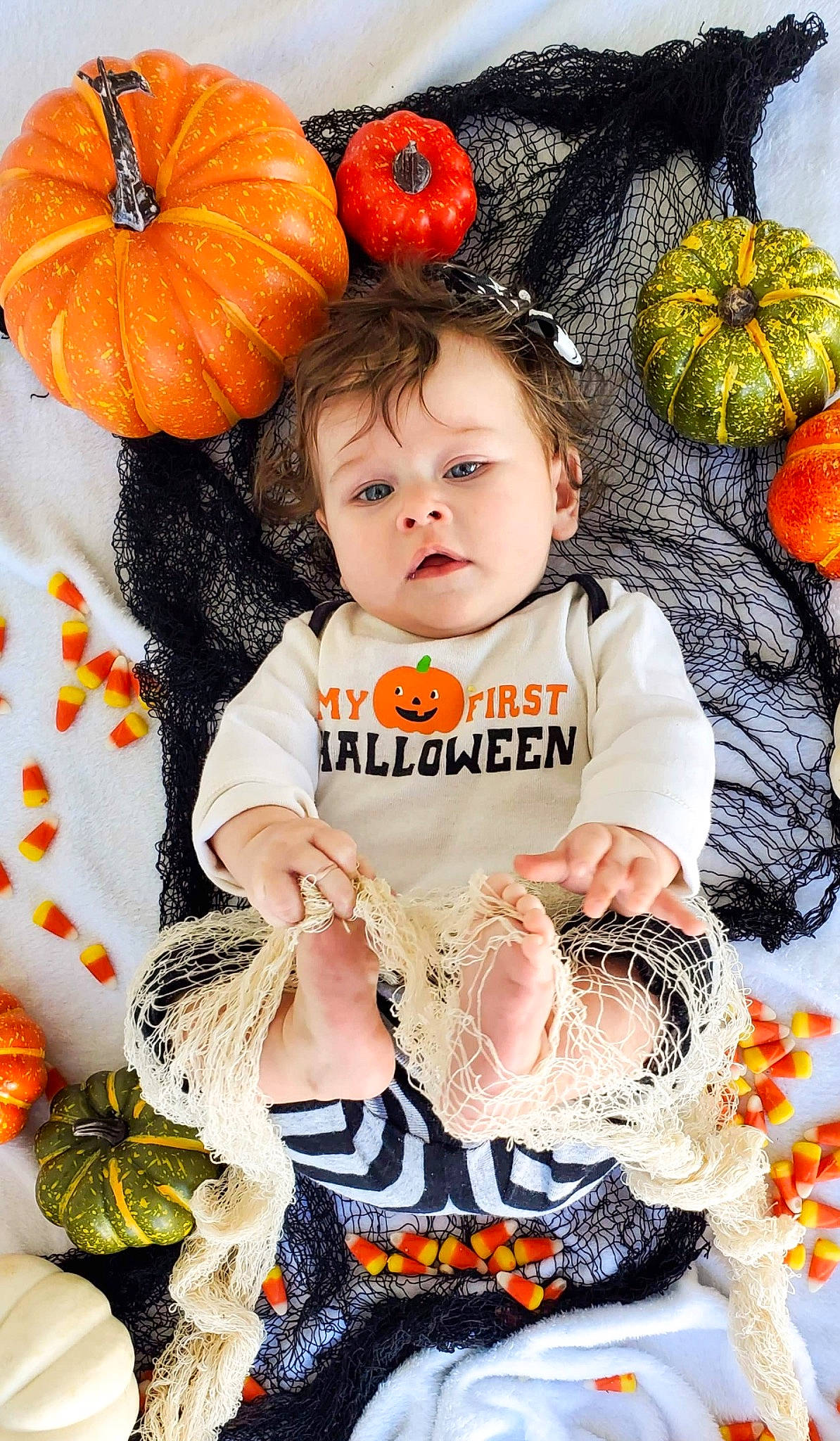 Claire is registered to the contest to win money with this photo: baby, baby_toddler_clothing, beauty, calabaza, child, cucurbita, facial_expression, gourd, happy, local_food, natural_foods, orange, people_in_nature, person, plant, pumpkin, squash, toddler, vegetable, whole_food