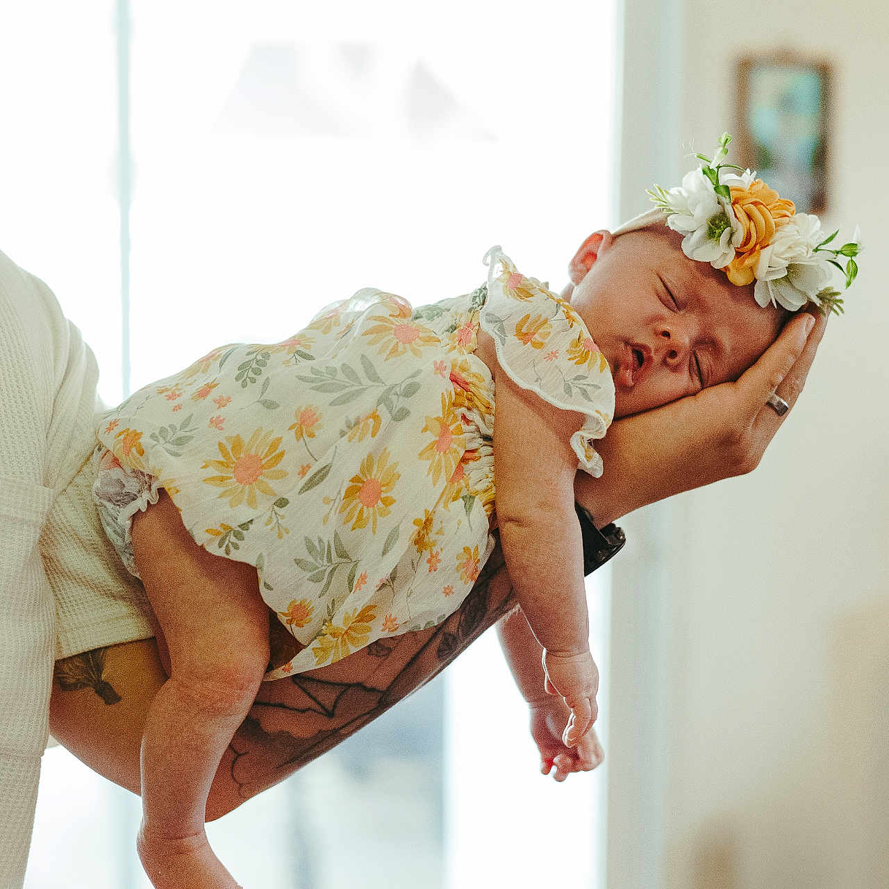 Sadie joined the competition — help win amazing prizes! arm, baby, baby_dress, child, cute, floral_dress, flower, flower_crown, foot, hand, hand_holding, indoor, newborn, peaceful, person, portrait, skin, sleeping, soft_light, tattoo