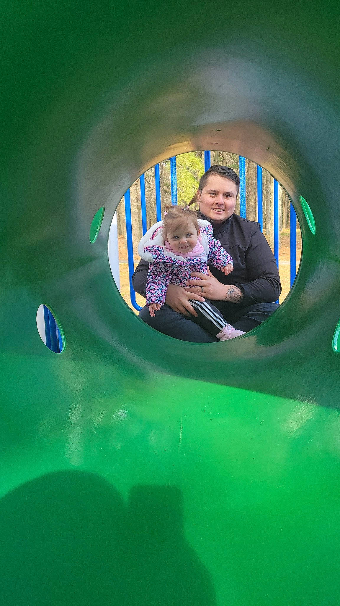 Raelynn joined the competition — help win amazing prizes! baby, baby_toddler_clothing, child, circle, city, electric_blue, flash_photography, fun, grass, happy, inflatable, joy, leisure, magenta, outdoor_play_equipment, person, play, playground, recreation, sitting