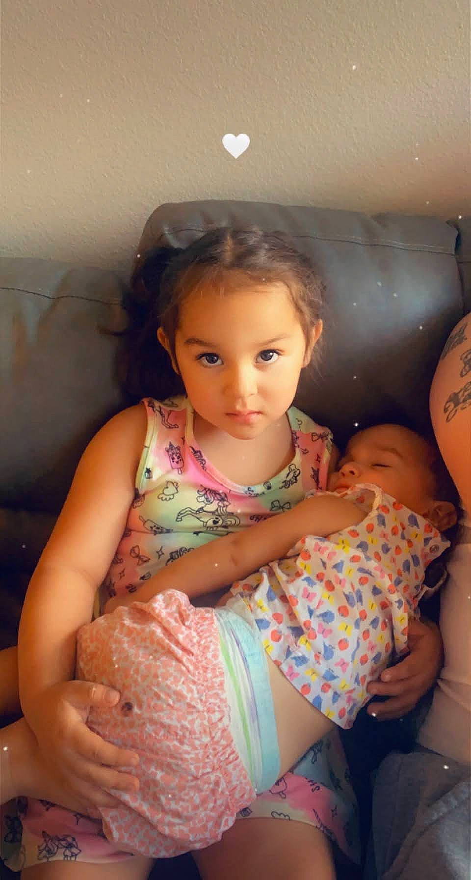 Emely is registered to the contest to win money with this photo: arm, cheek, eye, facial_expression, finger, flash_photography, hand, happy, head, human_body, joint, leg, mouth, muscle, organ, person, pink, shoulder, skin, stomach