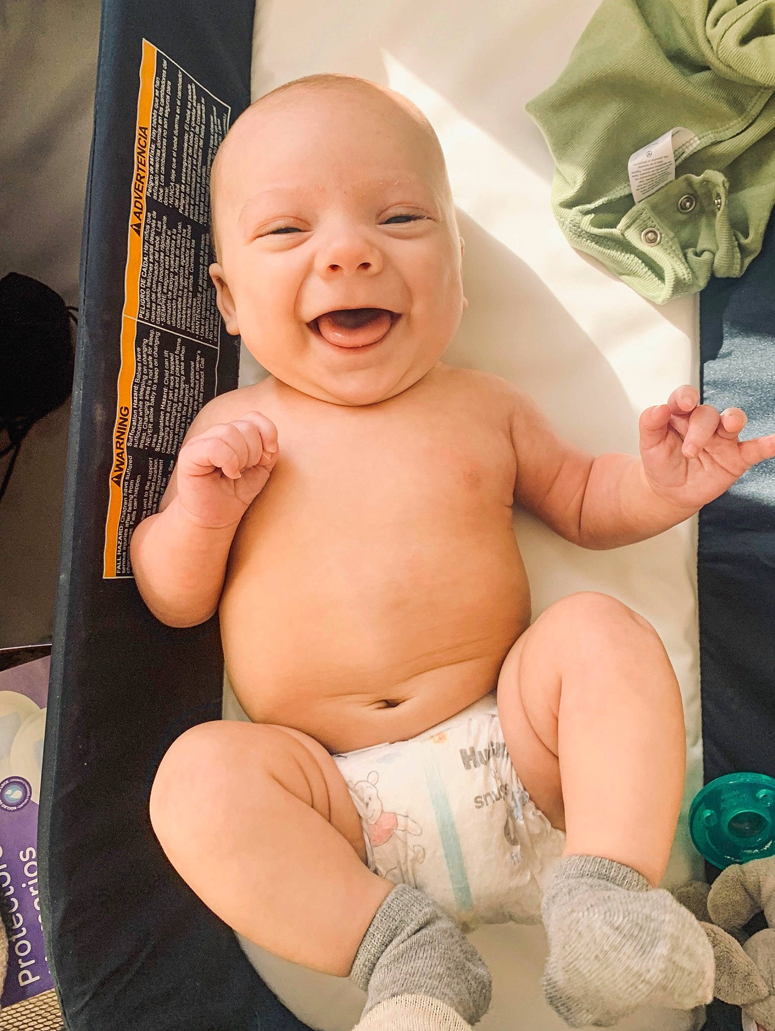 Boone is registered to the contest to win money with this photo: arm, baby, cheek, comfort, eyebrow, finger, hand, happy, human, human_body, mouth, muscle, nose, person, product, skin, smile, stomach, thigh, thumb