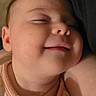 Willow joined the competition — help win amazing prizes! baby, sleeping, smile, pajamas, infant, face, hand, cozy, closeup, child, rest, peaceful, soft, blanket, pillow, skin, cute, portrait, indoors, relaxation