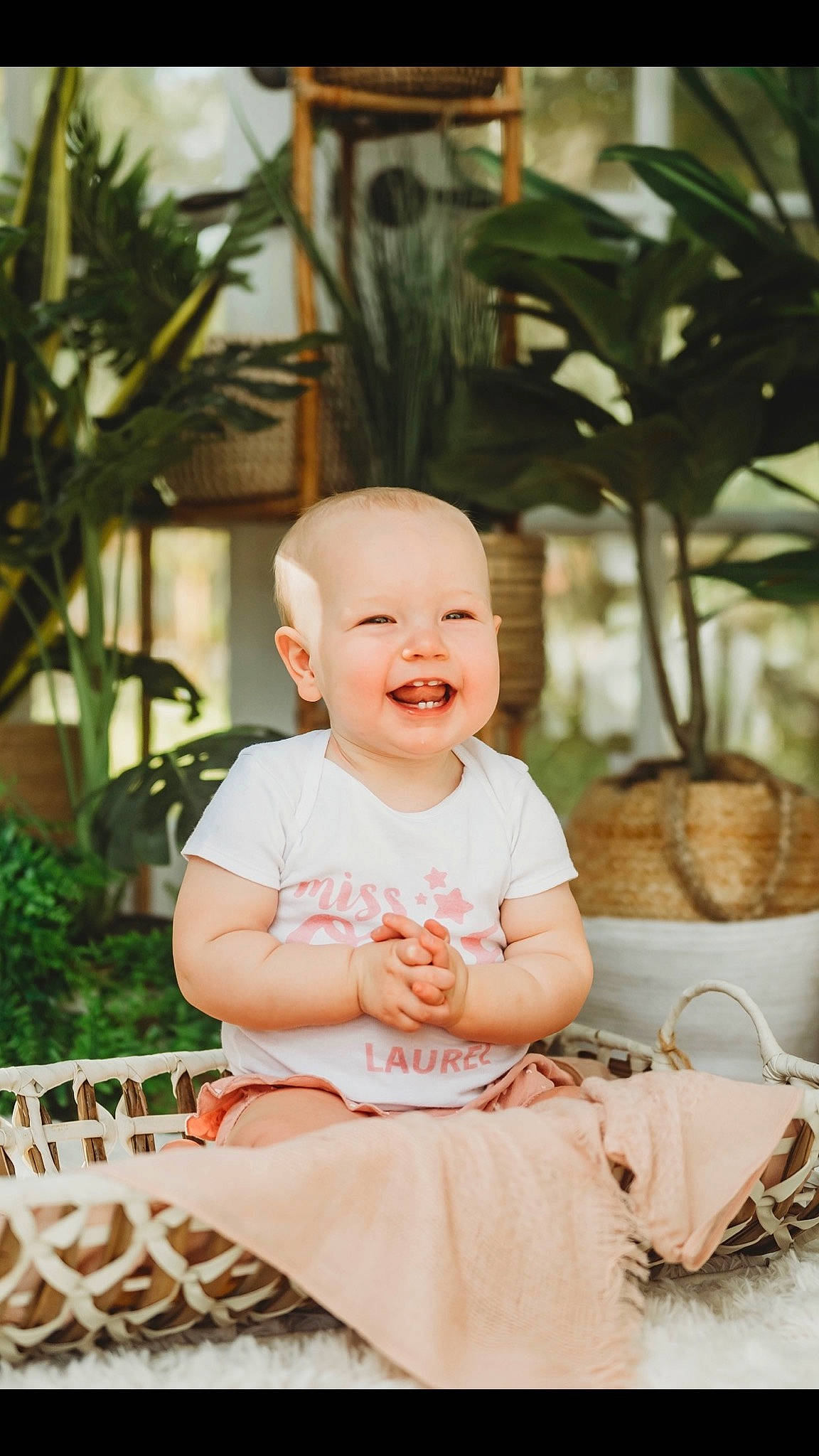 Laurel joined the competition — help win amazing prizes! baby, baby_toddler_clothing, bag, child, dress, event, facial_expression, flash_photography, fun, grass, happy, joy, leisure, luggage_and_bags, peach, person, plant, sitting, skin, smile