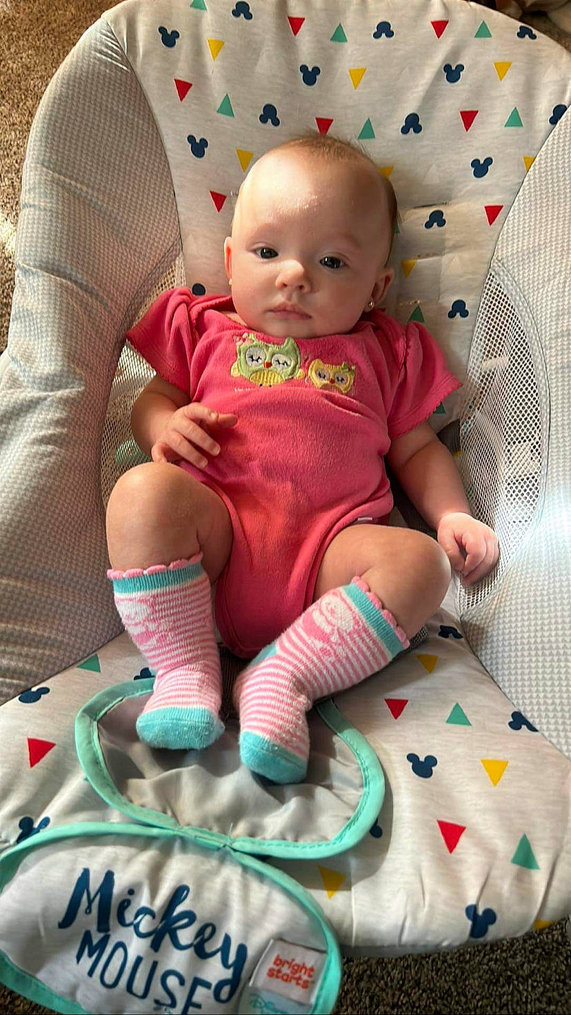 Aliviah joined the competition — help win amazing prizes! baby, baby_products, baby_toddler_clothing, cheek, child, comfort, foot, green, human_leg, lap, linens, person, pink, sitting, skin, sleeve, sock, textile, thigh, toddler