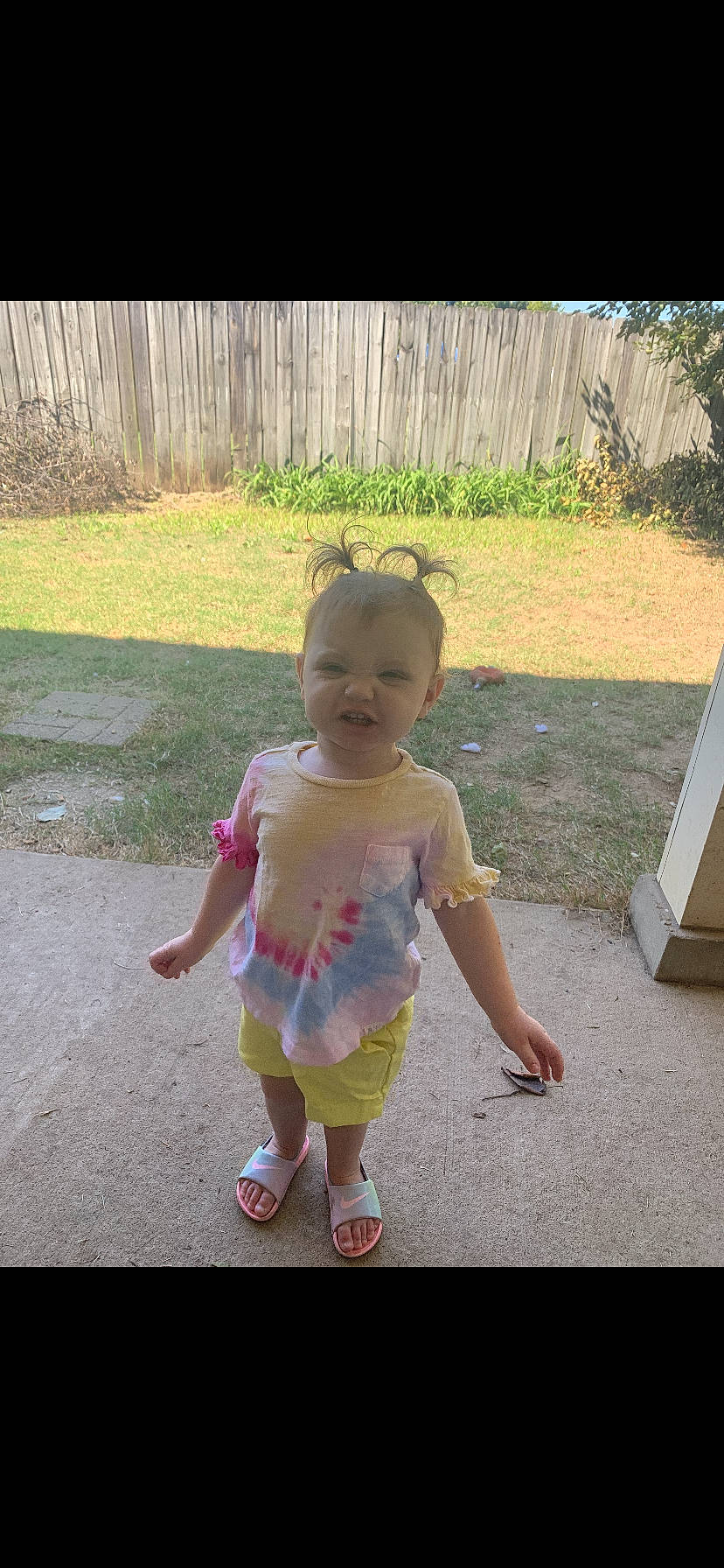 Kynslee is registered to the contest to win money with this photo: baby, baby_toddler_clothing, botany, child, dress, eye, fun, gesture, grass, happy, leaf, leg, leisure, morning, people_in_nature, person, pink, plant, sandal, sitting