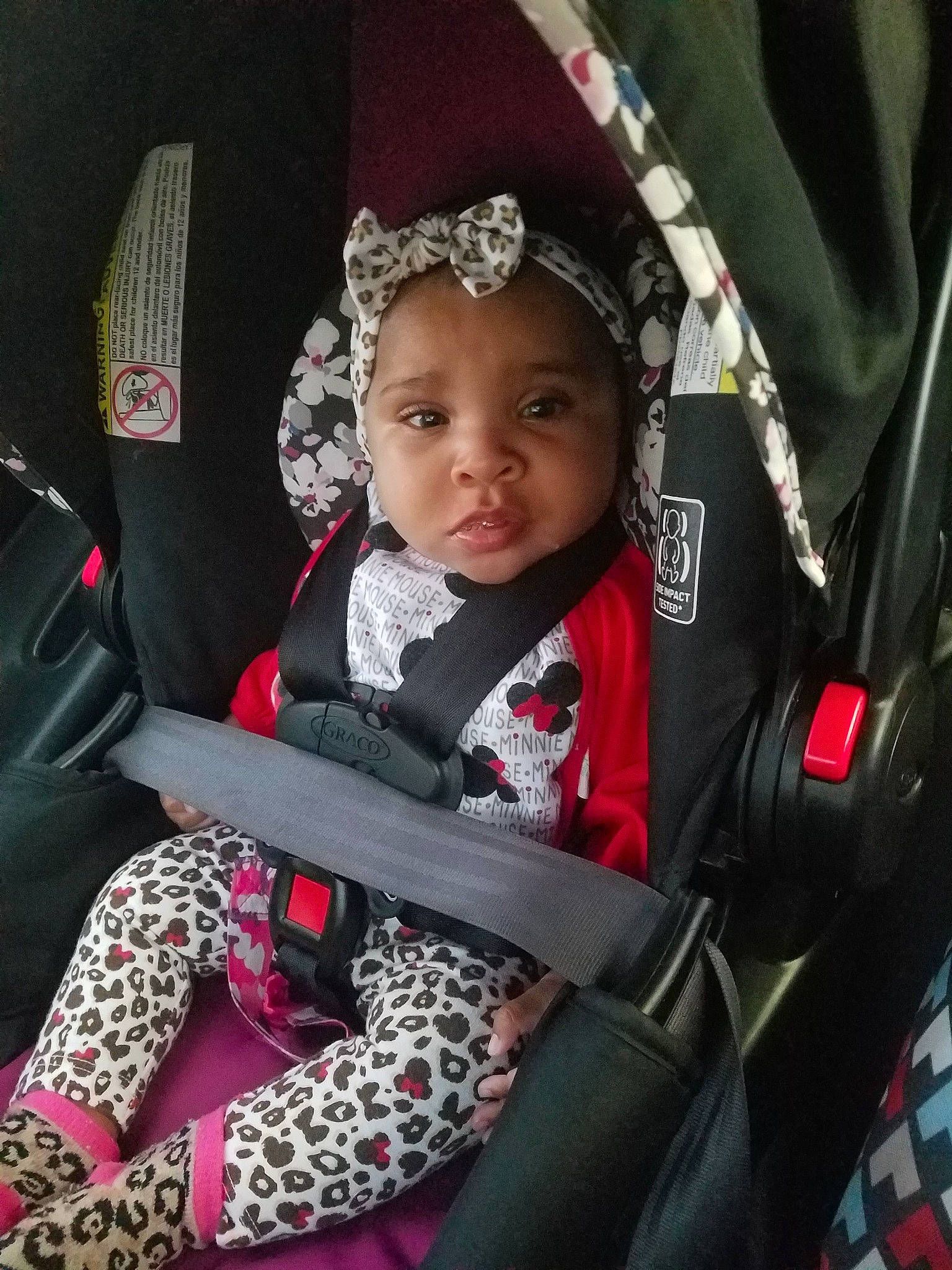 Adriannah is registered to the contest to win money with this photo: auto_part, baby, baby_carriage, baby_in_car_seat, baby_products, car, car_seat, car_seat_cover, child, person, product, seat_belt, sitting, smile, toddler