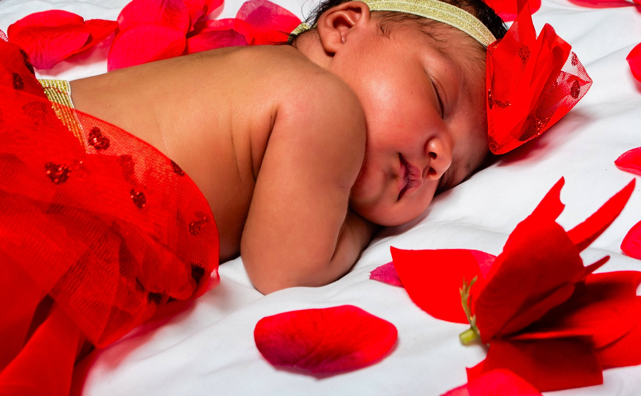 Amaria is registered to the contest to win money with this photo: baby, baby_sleeping, child, love, person, petal, red, valentines_day