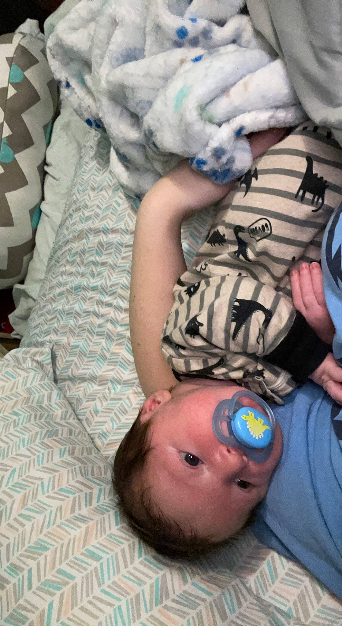 Cashton is registered to the contest to win money with this photo: baby, baby_products, baby_toddler_clothing, blue, cheek, child, comfort, finger, fun, gesture, happy, linens, nail, pattern, person, skin, sleeve, thumb, toddler, white