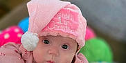Brynlee joined the competition — help win amazing prizes! baby, infant, pink_hat, christmas_hat, holiday, candy_cane_pattern, cute, face, eyes, clothing, indoors, toy, colorful, child, portrait, festive, soft_texture, young_child, looking_at_camera, warm_lighting