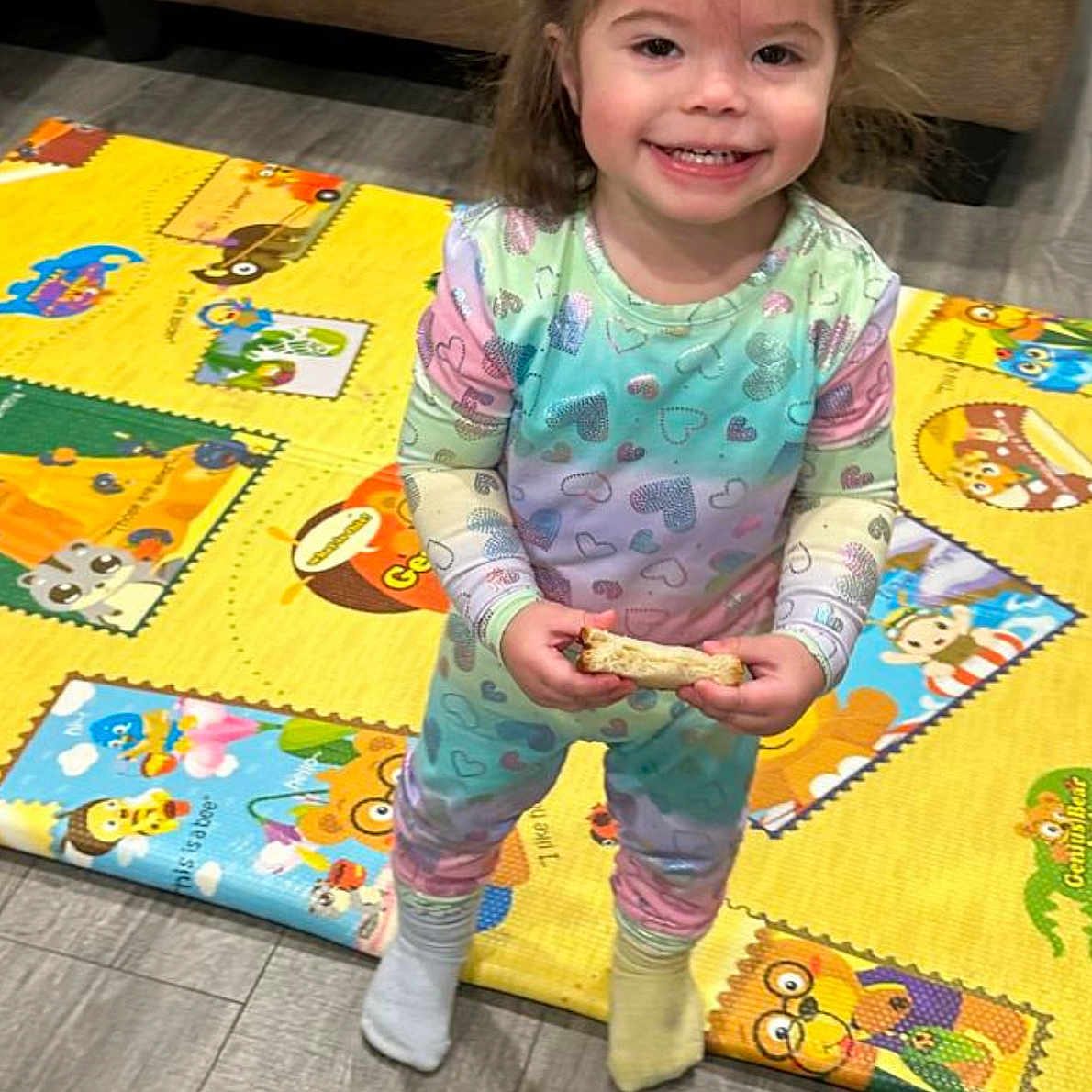 Isabella joined the competition — help win amazing prizes! child, clothing, couch, cushion, face, female, furniture, girl, head, homedecor, hosiery, indoors, mat, pajamas, pants, person, photography, portrait, sock, standing