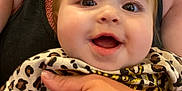 Zhavia joined the competition — help win amazing prizes! baby, smiling, face, person, hand, tattoo, clothing, leopard_print, infant, happy, cute, skin, adult, arm, tank_top, indoor, closeup, expression, joy, holding