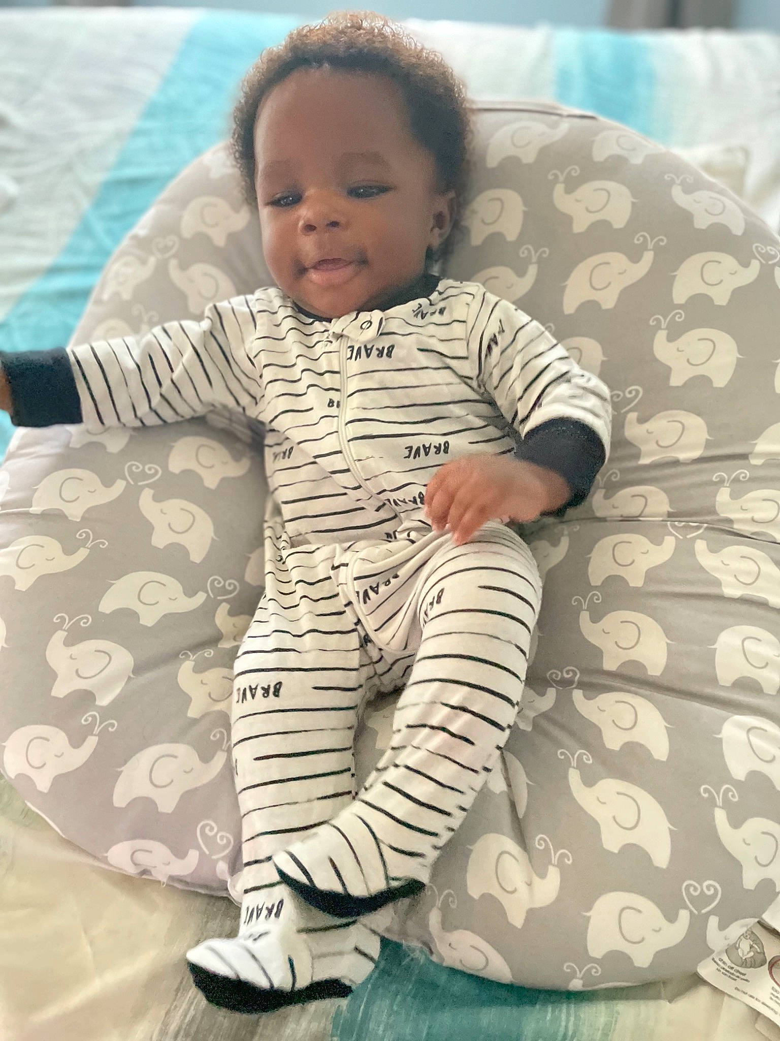 Syncere joined the competition — help win amazing prizes! arm, baby, baby_toddler_clothing, cheek, comfort, eye, face, finger, hairstyle, hand, happy, head, human, human_body, neck, person, shoulder, skin, sleeve, textile