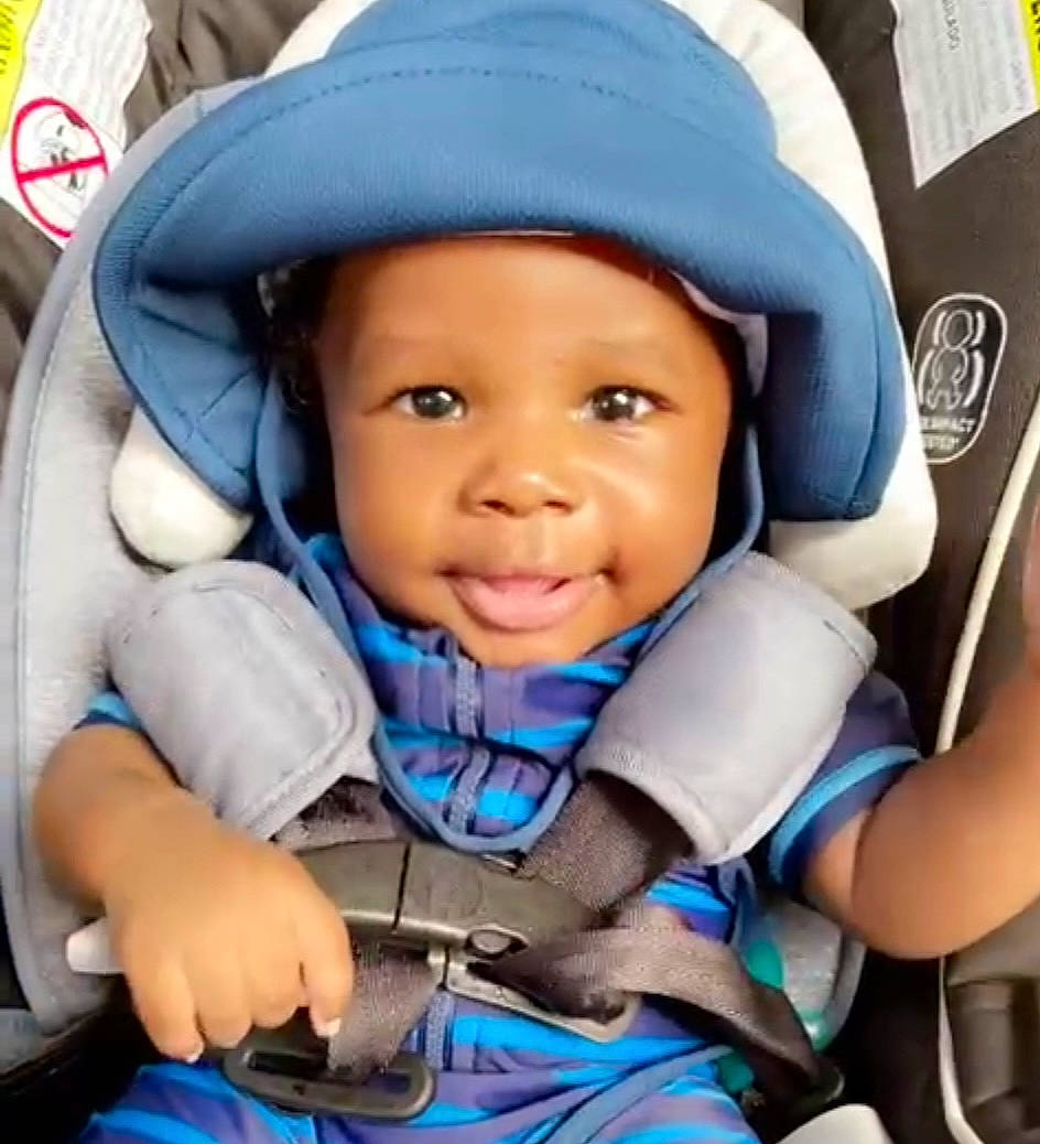 Syncere is registered to the contest to win money with this photo: baby, baby_carriage, baby_products, blue, cap, car_seat, cheek, child, comfort, cool, eye, eyebrow, finger, gesture, happy, headwear, human, person, skin, smile