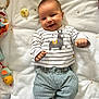 Jude participe au concours pour gagner de l'argent avec cette photo : baby, smiling, lying_down, striped_shirt, llama_design, striped_pants, pacifier, toy, blanket, star_pattern, infant, cute, happy, child, soft_toys, clothing, indoors, portrait, baby_girl_or_boy, playtime