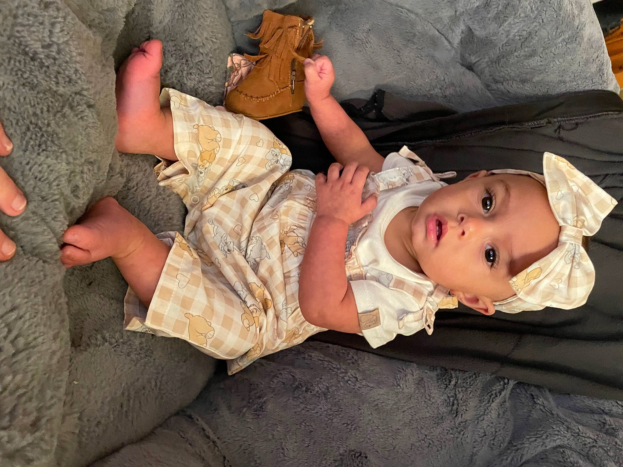 Armoni joined the competition — help win amazing prizes! baby, baby_toddler_clothing, barefoot, child, comfort, finger, foot, fun, gesture, grass, headwear, human_leg, knee, lap, person, room, sitting, skin, sleep, thigh