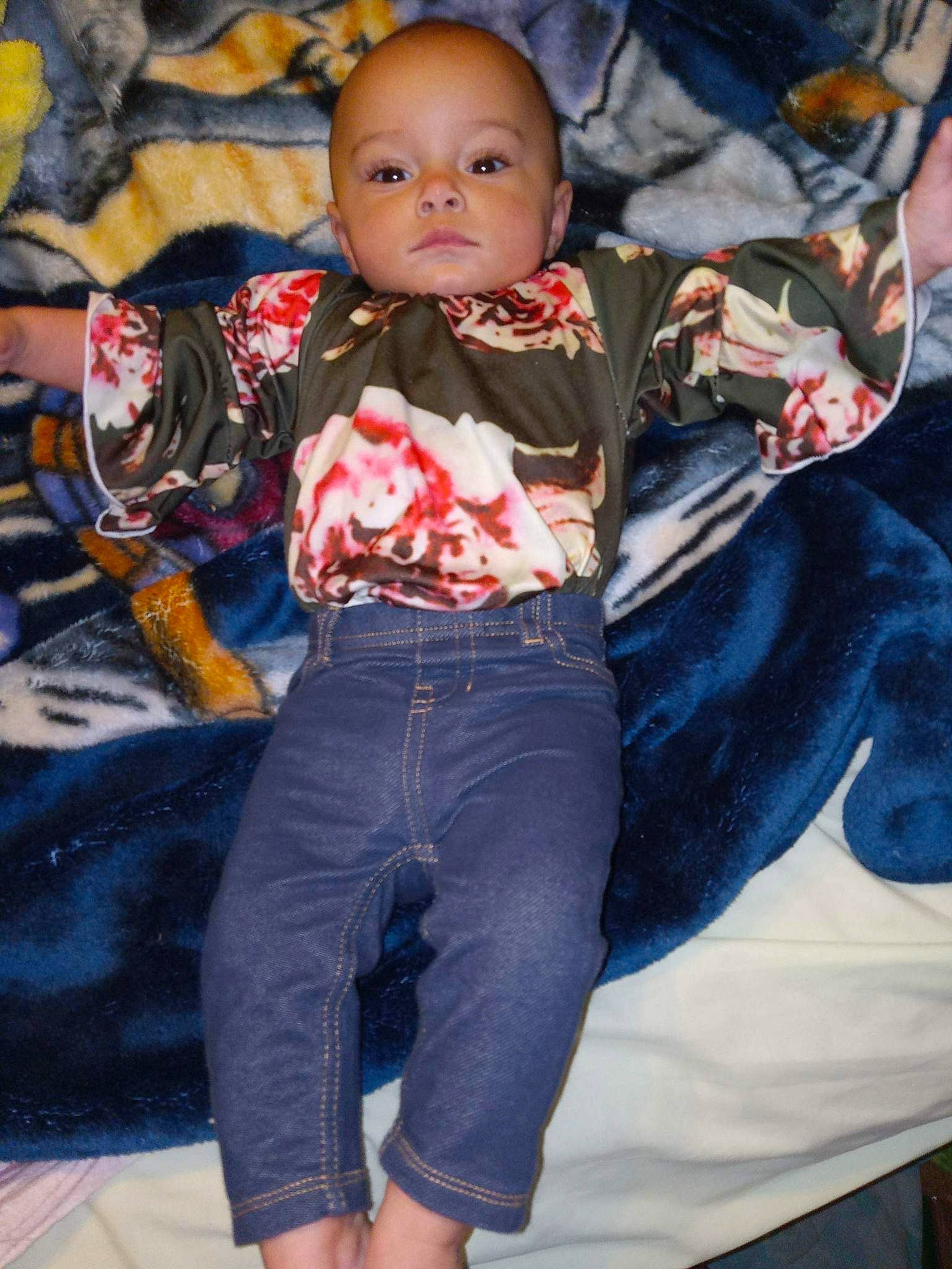 Armoni is registered to the contest to win money with this photo: baby, baby_toddler_clothing, child, denim, electric_blue, event, facial_expression, flash_photography, fun, happy, person, portrait_photography, sitting, sleeve, t_shirt, toddler, tradition, vacation