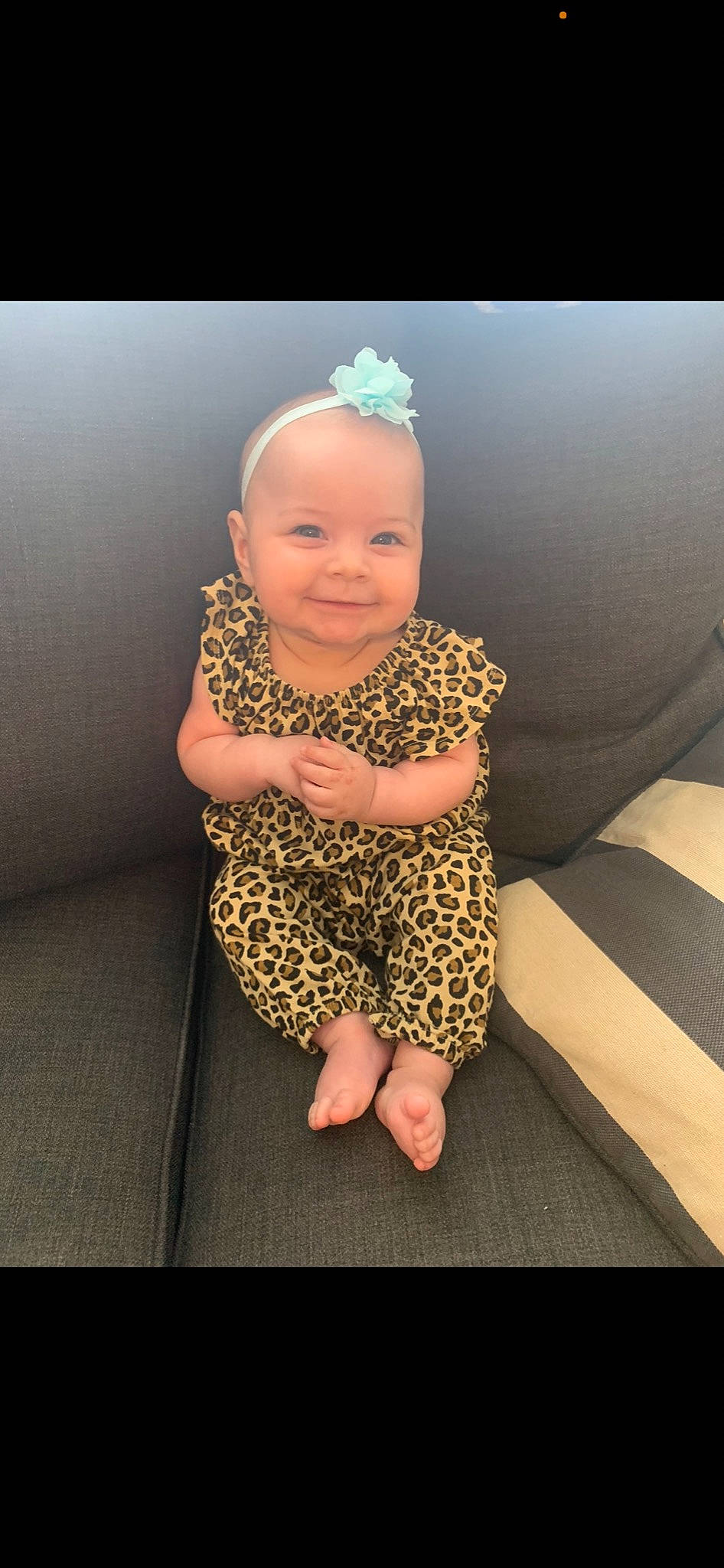 Avalee is registered to the contest to win money with this photo: baby, baby_toddler_clothing, cheek, chin, dress, eye, face, flash_photography, flooring, happy, head, human_body, human_leg, iris, joy, person, skin, sleeve, smile, thumb