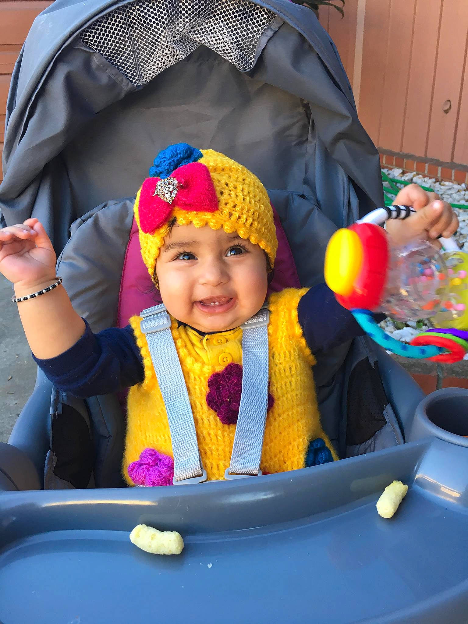Alia joined the competition — help win amazing prizes! cap, child, fun, hat, headgear, infant, person, play, product, smile, toddler, yellow